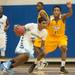 Skiyline's Sharath Anand dribbles past Ypsilanti's Corey Allen during their game at Skiyline High school Tuesday, Jan. 15.

Courtney Sacco I AnnArbor.com  